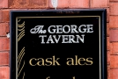 Sign on a pub in Oldham. "George Tavern"