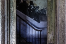 Artist depiction of immigrants climbing a stairway