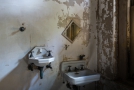 Askew mirror with sinks. Possibly for adult and child